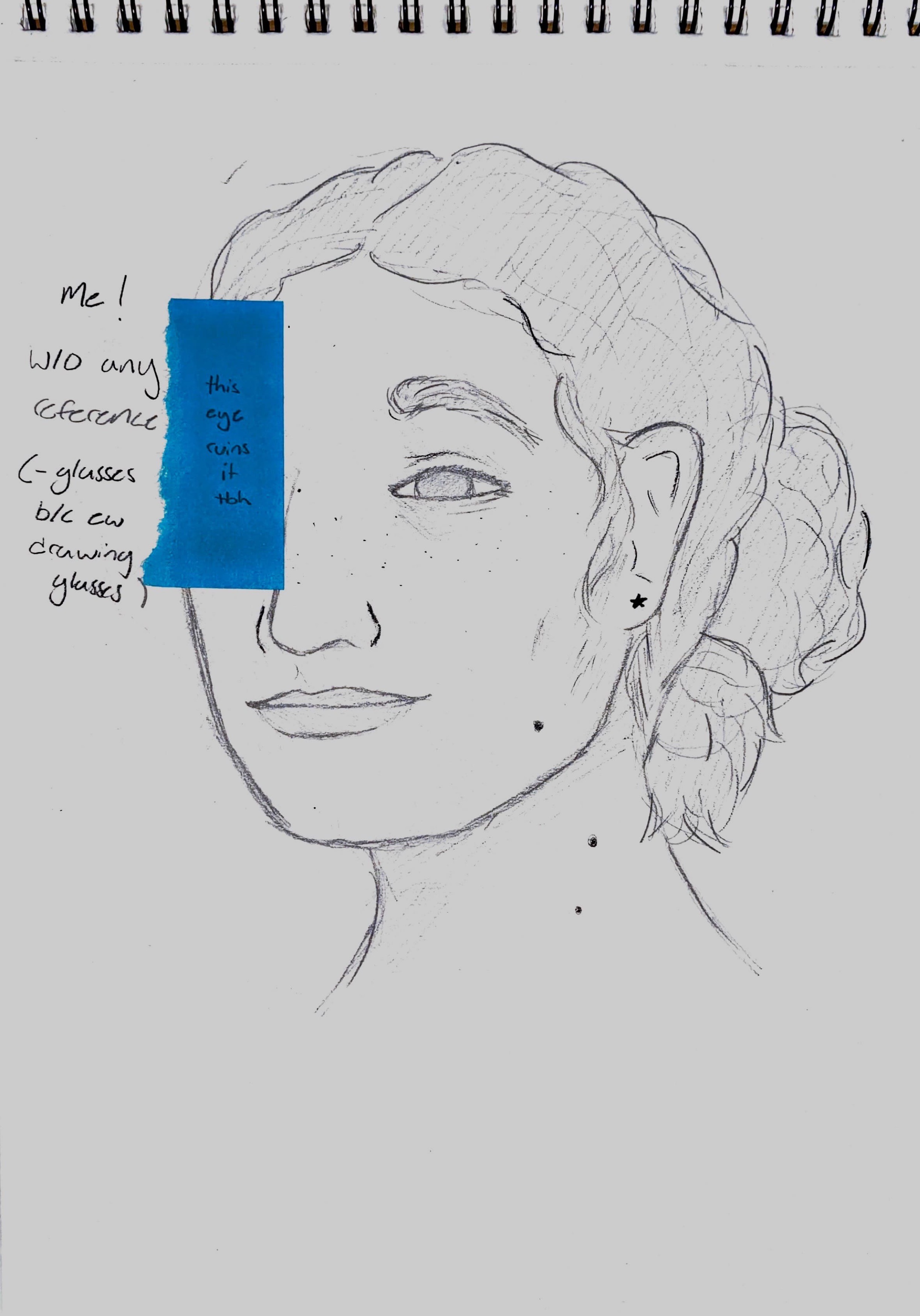 a self portrait of me with my hair up, one of my eyes is covered with a sticky note